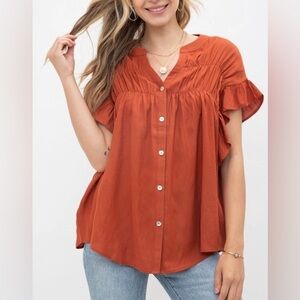 Burnt orange button up top size S